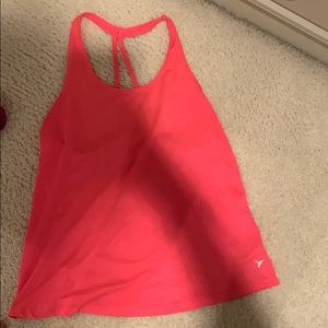 loosely fitted racer back tank top in hot pink